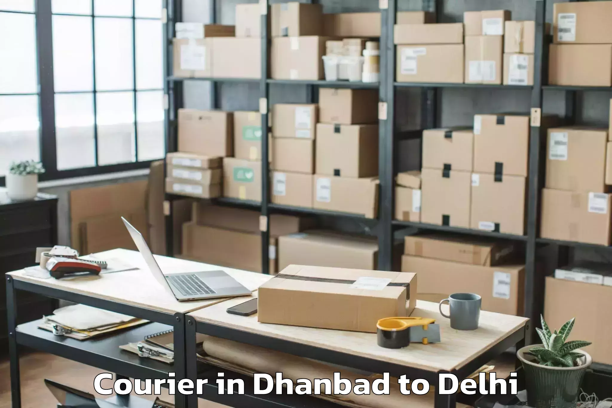 Trusted Dhanbad to Nangloi Jat Courier